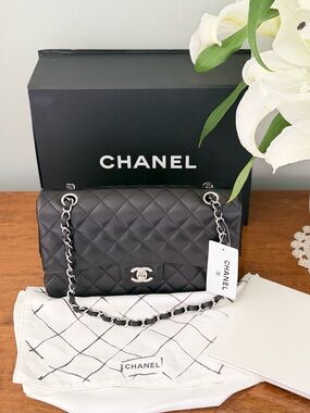 CHANEL Black Quilted Leather Shoulder Bag with Silver Hardware